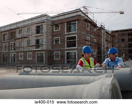 Engineers on building site View Large Photo Image Stock Photography - Engineers on building site. Fotosearch