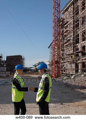 Engineers shaking hands View Large Photo Image Stock Photo - Engineers shaking hands. Fotosearch