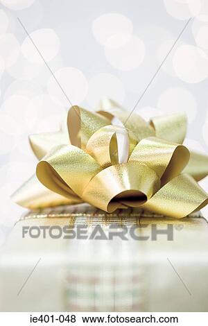 Bow on a christmas present View Large Photo Image Stock Photo - Bow on a christmas present. Fotosearch