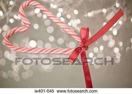 Candy canes in heart shape View Large Photo Image Stock Photography - Candy canes in heart shape. Fotosearch