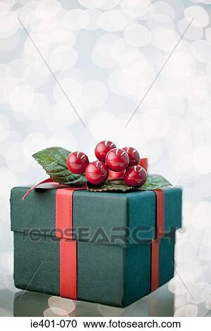 Christmas gift with berry decoration View Large Photo Image Stock Image - Christmas gift with berry decoration. Fotosearch