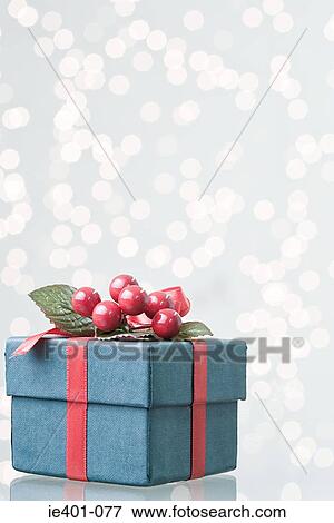 Christmas gift with berry decoration View Large Photo Image Stock Photo - Christmas gift with berry decoration. Fotosearch