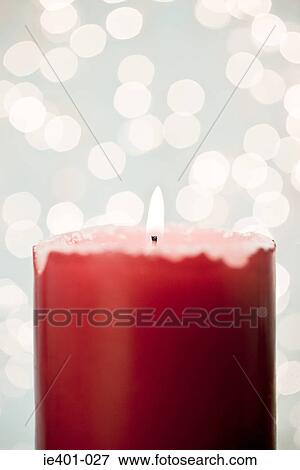 Stock Photo - Red candle. Fotosearch