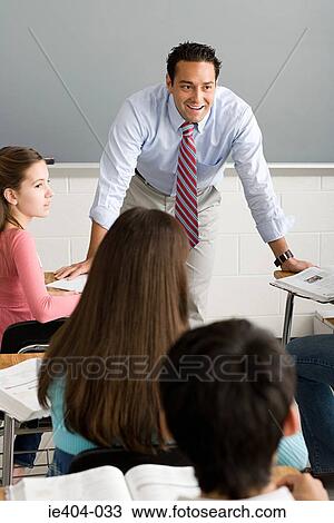 A teacher talking to his class View Large Photo Image Stock Image - A teacher talking to his class. Fotosearch