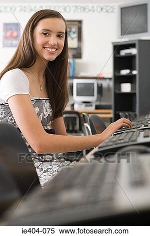 Girl in computer room View Large Photo Image Stock Photography - Girl in computer room. Fotosearch