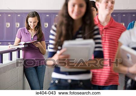 High school students in a school corridor View Large Photo Image Stock Image - High school students in a school corridor. Fotosearch