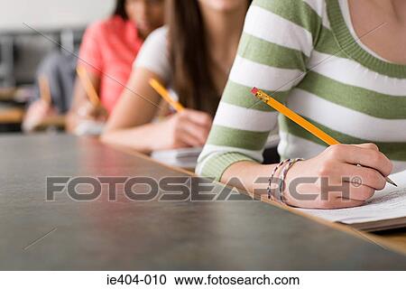 Stock Image - High school students writing. Fotosearch