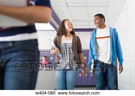 Stock Image - School students in corridor. Fotosearch