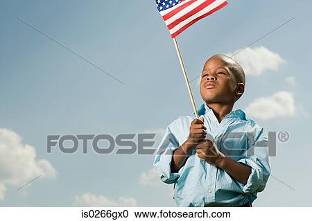 Boy with an american flag View Large Photo Image Stock Image - Boy with an american flag. Fotosearch