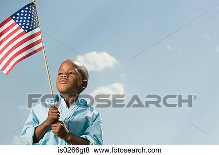 Boy with an american flag View Large Photo Image Stock Photo - Boy with an american flag. Fotosearch