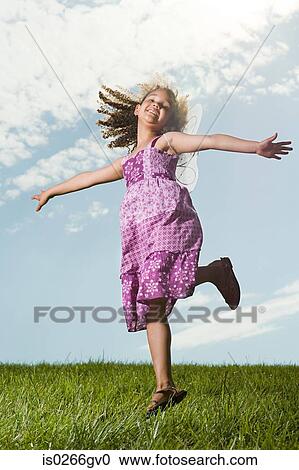 Girl jumping View Large Photo Image Stock Image - Girl jumping. Fotosearch
