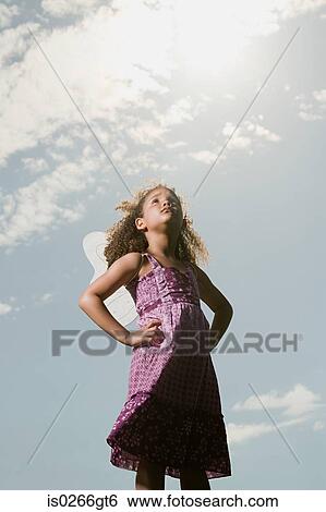 Stock Photograph - Girl with hands on hips. Fotosearch