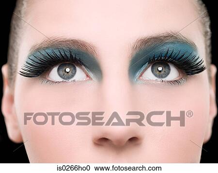 A young woman wearing false eyelashes View Large Photo Image Stock Image - A young woman wearing false eyelashes. Fotosearch