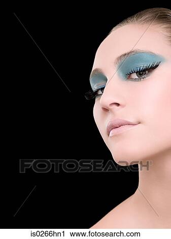 Portrait of a young woman wearing false eyelashes View Large Photo Image Stock Image - Portrait of a young woman wearing false eyelashes. Fotosearch