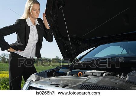 A woman having automobile trouble View Large Photo Image Stock Image - A woman having automobile trouble. Fotosearch