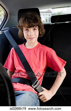 Portrait of a boy wearing a seatbelt View Large Photo Image Stock Photo - Portrait of a boy wearing a seatbelt. Fotosearch