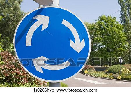 Picture - Traffic circle sign. Fotosearch