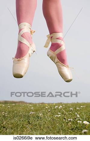 Ballerina jumping in a field View Large Photo Image Stock Image - Ballerina jumping in a field. Fotosearch