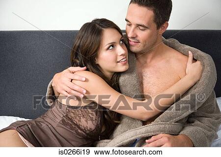 Stock Photo - A couple getting intimate. Fotosearch