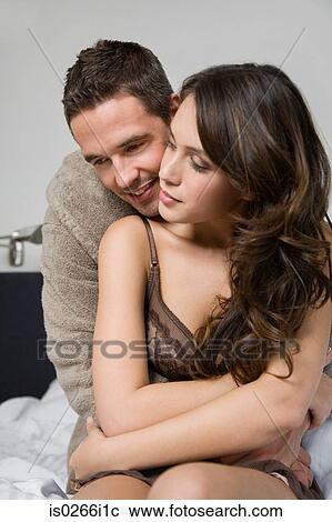 A couple hugging View Large Photo Image Stock Image - A couple hugging. Fotosearch