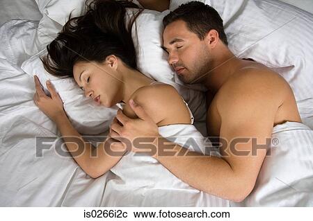 A couple sleeping View Large Photo Image Stock Image - A couple sleeping. Fotosearch