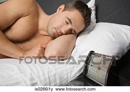 Stock Photo - A man sleeping. Fotosearch
