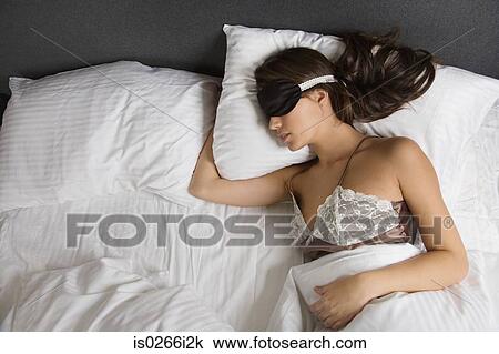 A woman sleeping View Large Photo Image Stock Image - A woman sleeping. Fotosearch