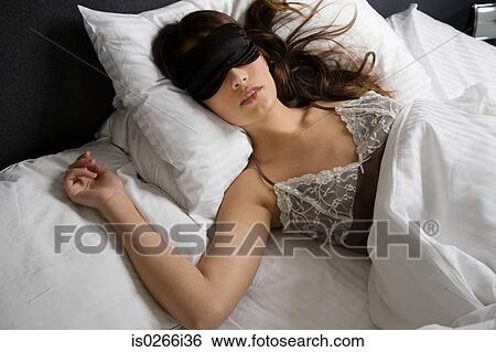 A woman sleeping View Large Photo Image Stock Photograph - A woman sleeping. Fotosearch