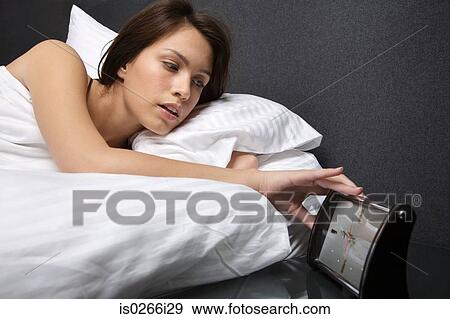 A woman waking up View Large Photo Image Stock Photo - A woman waking up. Fotosearch