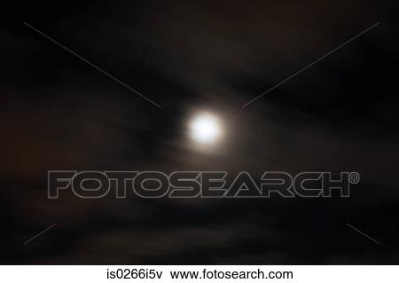 Stock Photo - Moon in sky. Fotosearch