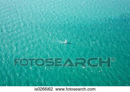 Stock Image - Yacht on ocean. Fotosearch