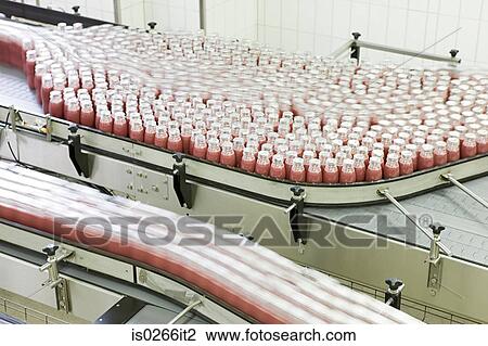 Stock Image - Bottles being made in a factory. Fotosearch