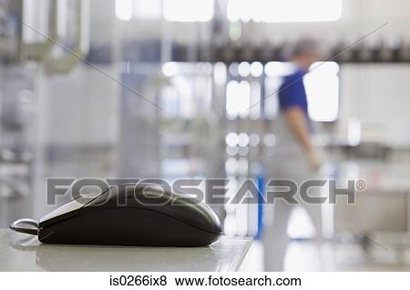 Computer mouse with person in background View Large Photo Image Stock Photo - Computer mouse with person in background. Fotosearch