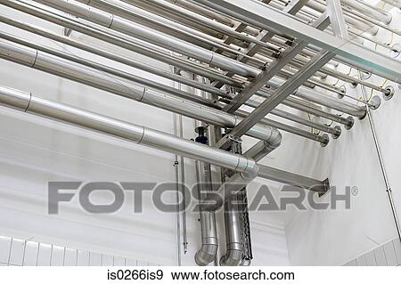 Industrial piping in a factory View Large Photo Image Stock Photo - Industrial piping in a factory. Fotosearch