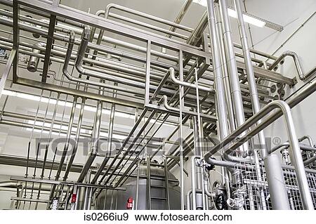 Industrial piping in a factory View Large Photo Image Stock Photo - Industrial piping in a factory. Fotosearch