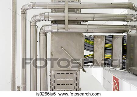 Industrial piping in a factory View Large Photo Image Stock Photograph - Industrial piping in a factory. Fotosearch