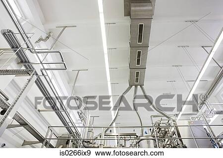 Low angle view of a factory ceiling View Large Photo Image Stock Photo - Low angle view of a factory ceiling. Fotosearch
