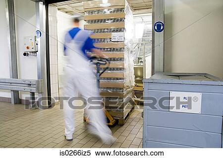 Man working in a factory View Large Photo Image Stock Photography - Man working in a factory. Fotosearch