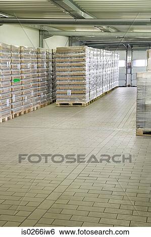 Pallets of stock in a warehouse View Large Photo Image Stock Photograph - Pallets of stock in a warehouse. Fotosearch