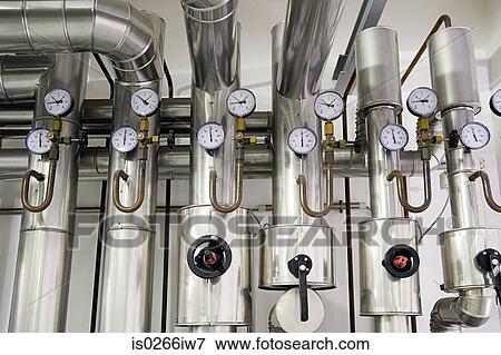 Pressure gauges in a factory View Large Photo Image Stock Photo - Pressure gauges in a factory. Fotosearch