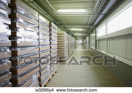 Picture - Row of stock pallets in a warehouse. Fotosearch