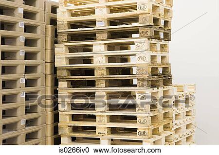 Stack of wooden pallets View Large Photo Image Stock Image - Stack of wooden pallets. Fotosearch