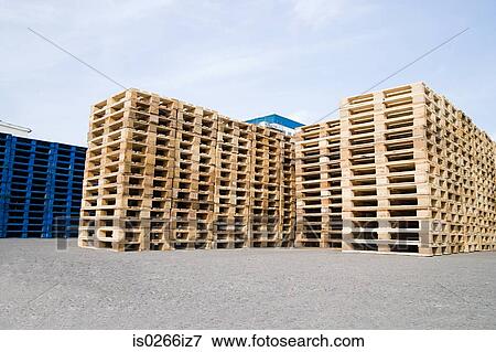 Stock Photo - Stacks of wooden pallets. Fotosearch