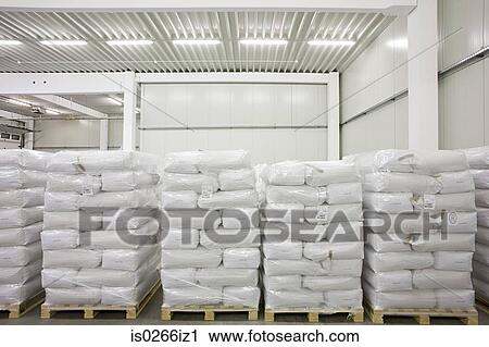 Stock Image - Stock stacked in a warehouse. Fotosearch