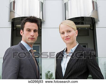 Portrait of two businesspeople outside a hotel View Large Photo Image Stock Image - Portrait of two businesspeople outside a hotel. Fotosearch
