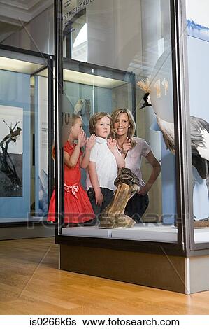 Mother with children at a museum View Large Photo Image Stock Photograph - Mother with children at a museum. Fotosearch