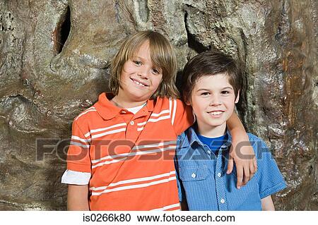 Two boys smiling View Large Photo Image Stock Image - Two boys smiling. Fotosearch