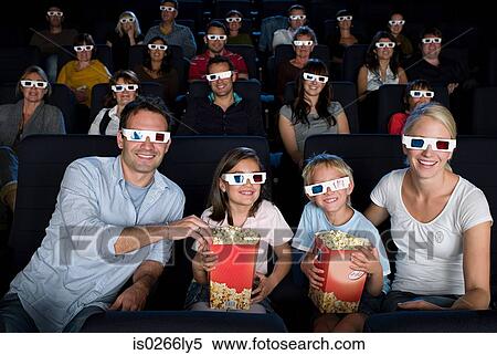 A cinema audience watching a 3d movie View Large Photo Image Stock Photography - A cinema audience watching a 3d movie. Fotosearch