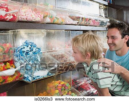 A father and son choosing sweets View Large Photo Image Stock Image - A father and son choosing sweets. Fotosearch
