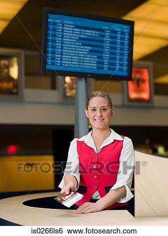 Portrait of box office sales assistant View Large Photo Image Stock Photograph - Portrait of box office sales assistant. Fotosearch